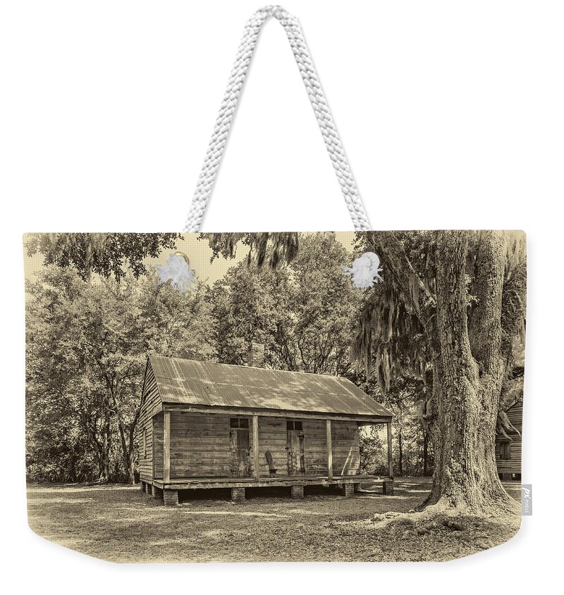 Evergreen Plantation Weekender Tote Bag featuring the photograph Slave Quarters 3 sepia by Steve Harrington