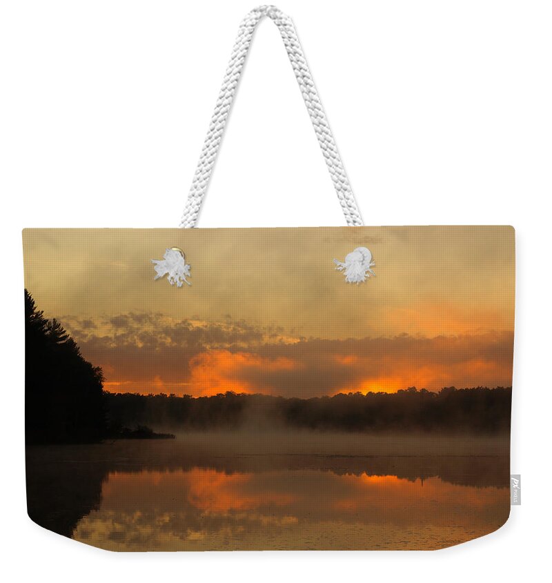 Sunrise Weekender Tote Bag featuring the photograph Smoke on the Water by Thomas Young