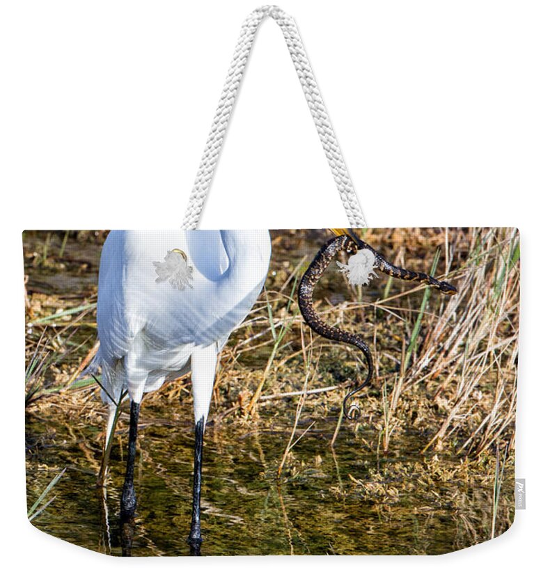 Great Weekender Tote Bag featuring the photograph Snake for Lunch by Ronald Lutz