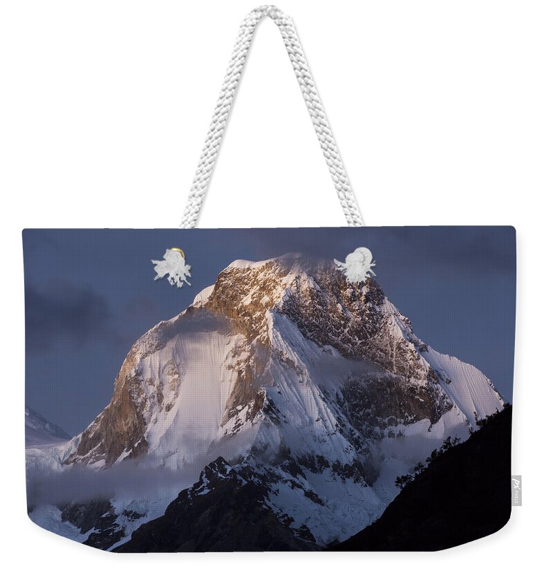 Cyril Ruoso Weekender Tote Bag featuring the photograph Snow-covered Peaks Huscaran Mountain by Cyril Ruoso