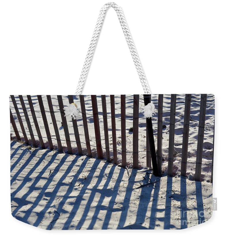 Snow Fence Weekender Tote Bag featuring the photograph Snow Fence by Lynellen Nielsen