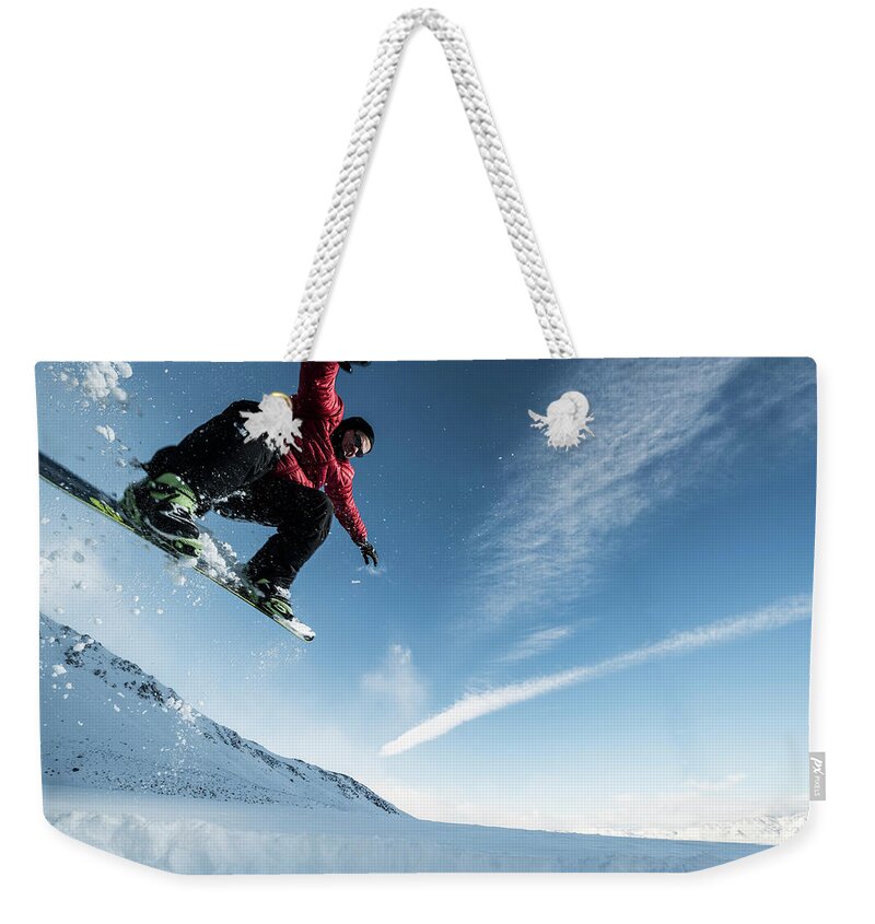 Extreme Terrain Weekender Tote Bag featuring the photograph Snowboard by Vernonwiley