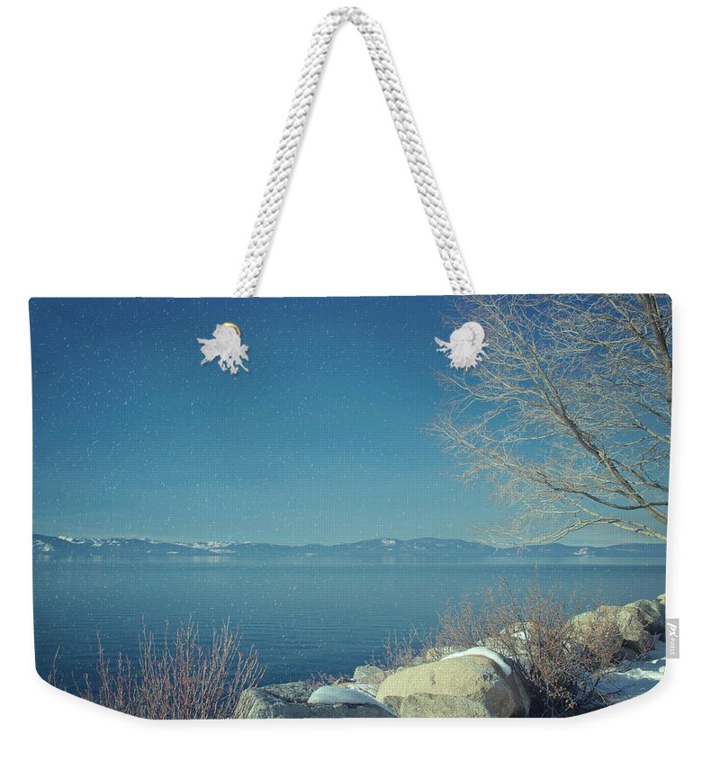 Lake Tahoe Weekender Tote Bag featuring the photograph Snowing in Tahoe by Kim Hojnacki