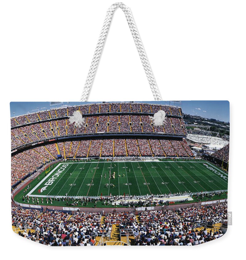 Photography Weekender Tote Bag featuring the photograph Sold Out Crowd At Mile High Stadium by Panoramic Images