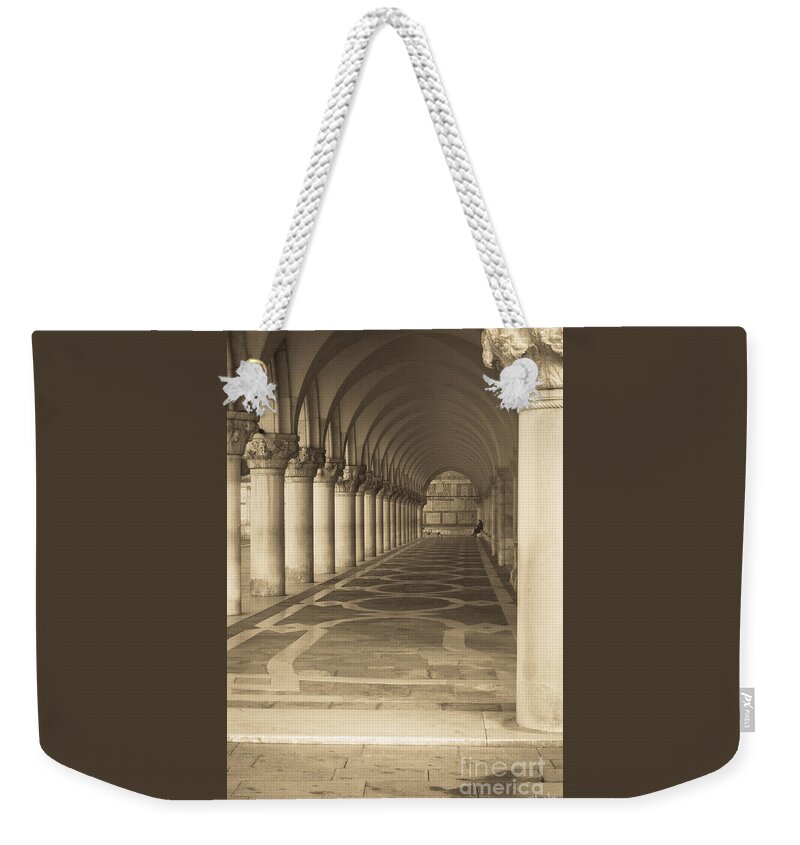 Italy Weekender Tote Bag featuring the photograph Solitude under Palace Arches by Prints of Italy