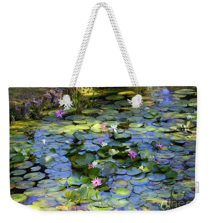 Lily Pond Weekender Tote Bag featuring the photograph Southern Lily Pond by Carol Groenen