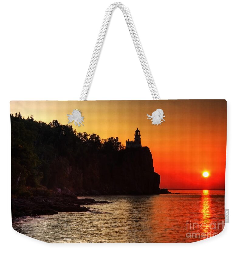 Sunrise Weekender Tote Bag featuring the photograph Split Rock Lighthouse - Sunrise by Wayne Moran