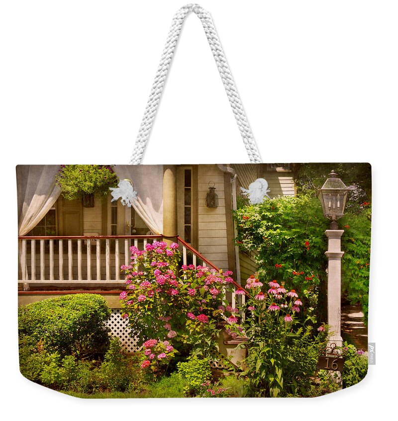 Flower Weekender Tote Bag featuring the photograph Spring - Summer's transition by Mike Savad