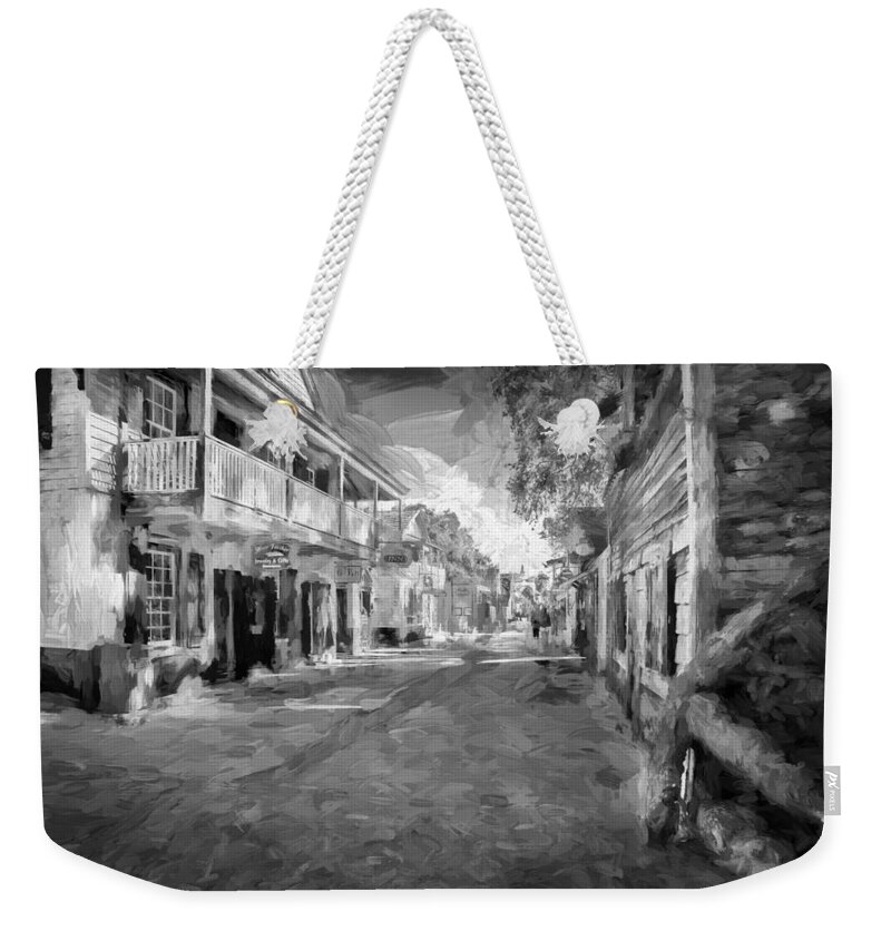 St. George Street Weekender Tote Bag featuring the photograph St George Street St Augustine Florida Painted BW by Rich Franco