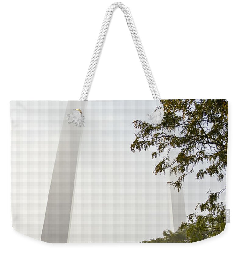 Autumn Colors Weekender Tote Bag featuring the photograph St Louis Arch in the early morning fog by Garry McMichael