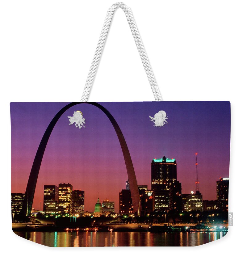 Photography Weekender Tote Bag featuring the photograph St. Louis Skyline And Arch At Night by Panoramic Images