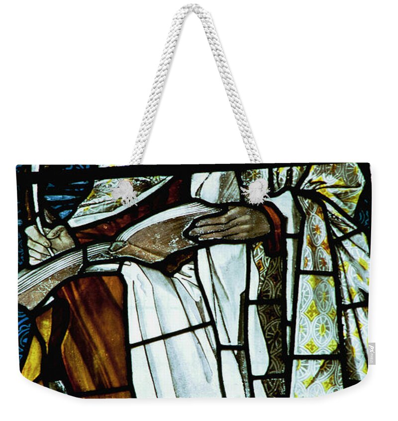 Saint Weekender Tote Bag featuring the photograph St Luke in stained glass by Philip Ralley