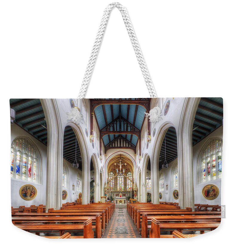 Yhun Suarez Weekender Tote Bag featuring the photograph St Mary's Catholic Church - The Nave by Yhun Suarez