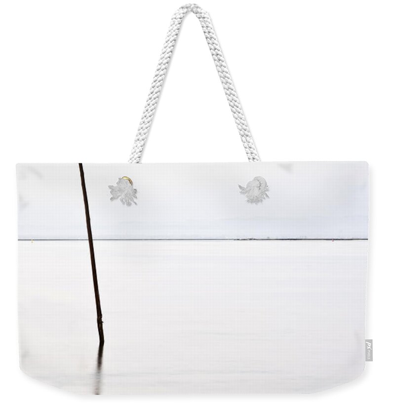 Waterscape Weekender Tote Bag featuring the photograph Standing alone by Jorge Maia