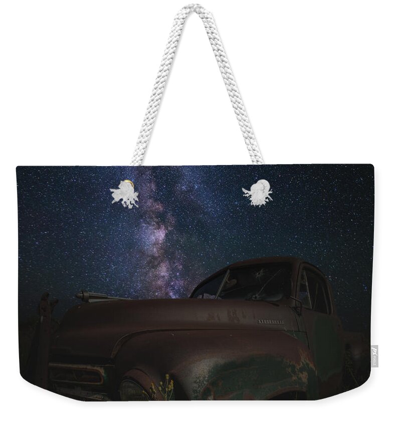 #abandoned #astroart #astronomy #astrophotographer #astrophotography #cosmos #decay #forgotten Weekender Tote Bag featuring the photograph Stardust and Rust Studebaker by Aaron J Groen