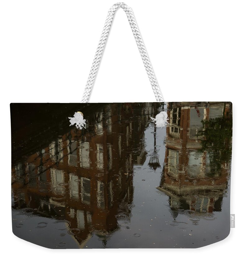 Irresistible Weekender Tote Bag featuring the photograph Starting to Rain... by Georgia Mizuleva