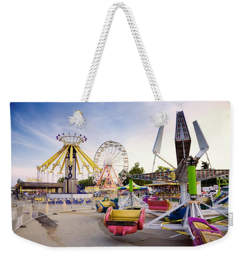 State Weekender Tote Bag featuring the photograph State fair by Alexey Stiop