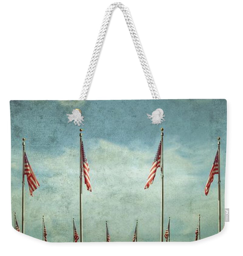 Steadfast Weekender Tote Bag featuring the photograph Steadfast by Marianna Mills