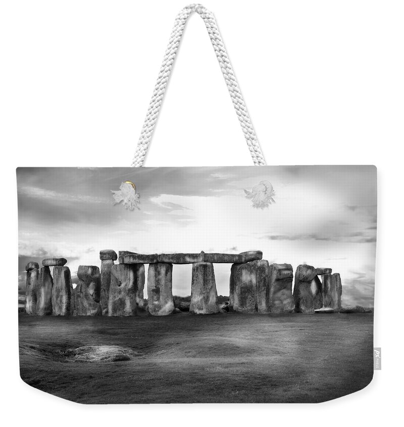 England Weekender Tote Bag featuring the photograph Stonehenge in the Rain by Denise Dube