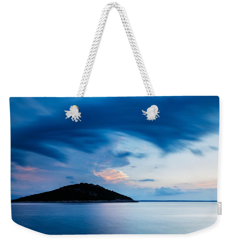 Croatia Weekender Tote Bag featuring the photograph Storm moving in over Veli Osir Island at sunrise by Ian Middleton