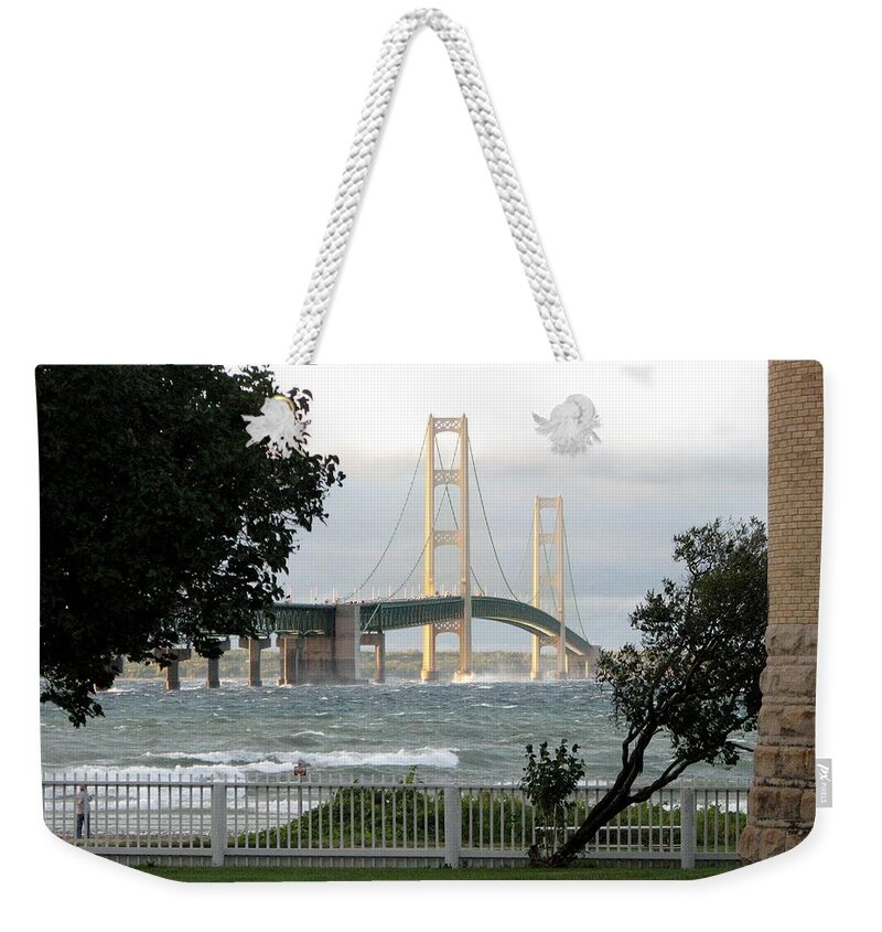 Mackinac Bridge Weekender Tote Bag featuring the photograph Stormy Straits of Mackinac 2 by Keith Stokes