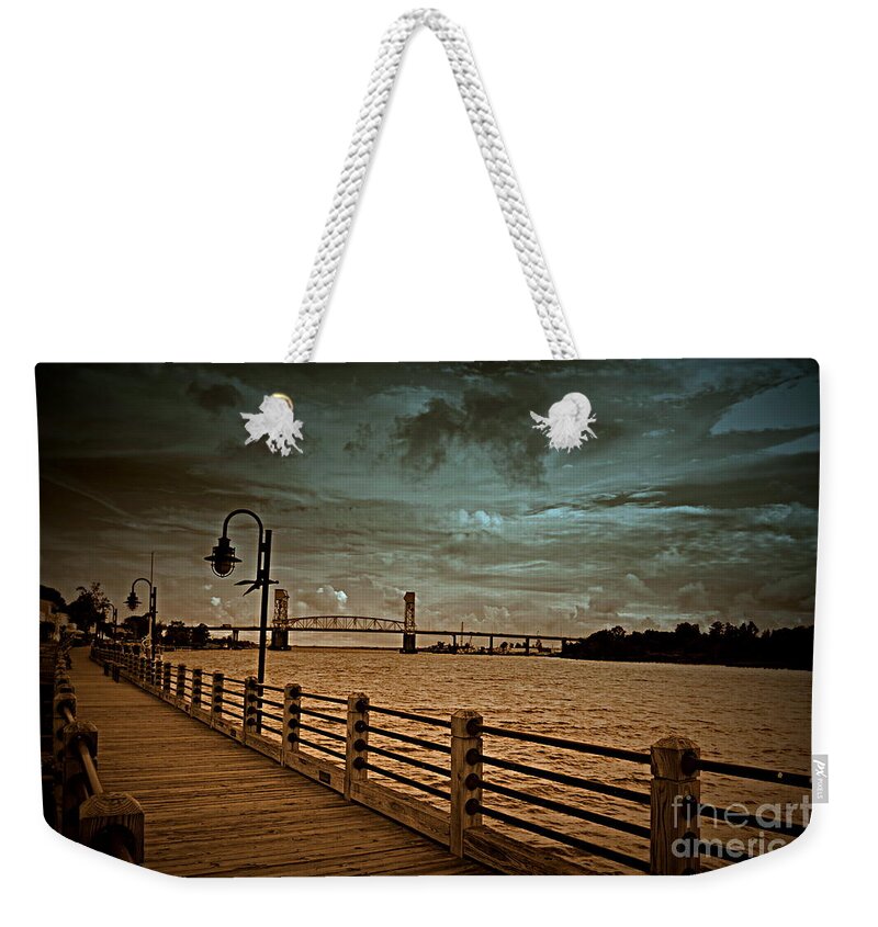 Wilmington Weekender Tote Bag featuring the photograph Stormy Wilmington Riverwalk by Amy Lucid