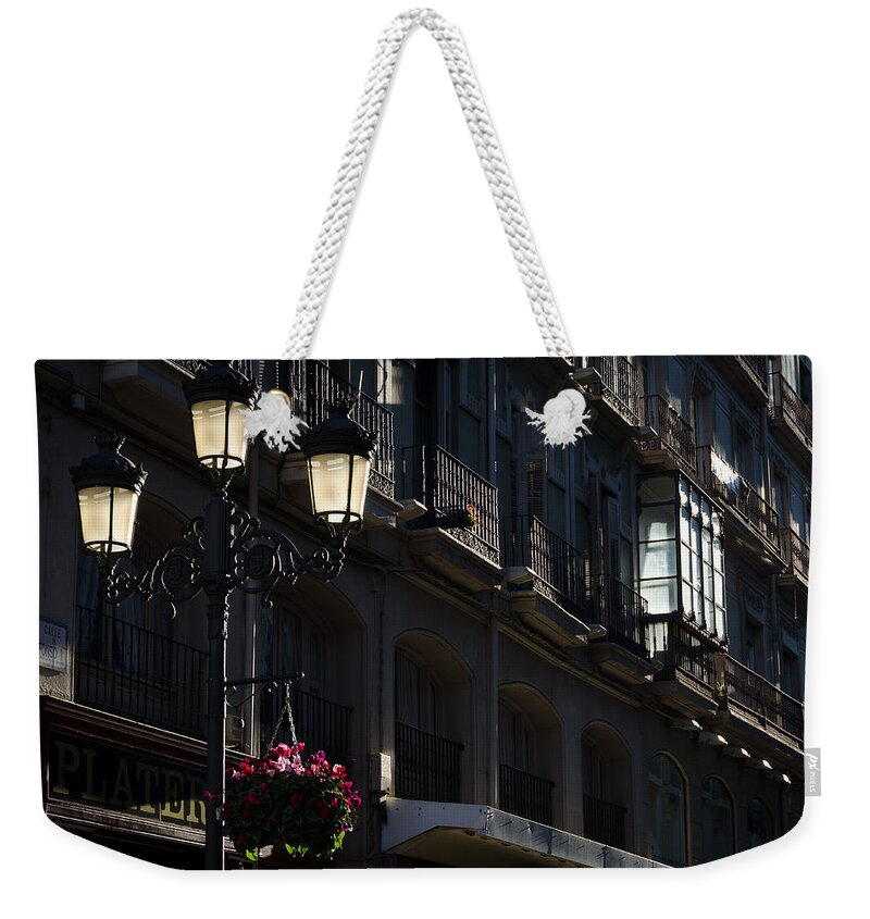 Street Weekender Tote Bag featuring the photograph Street at sunset. by Pablo Lopez