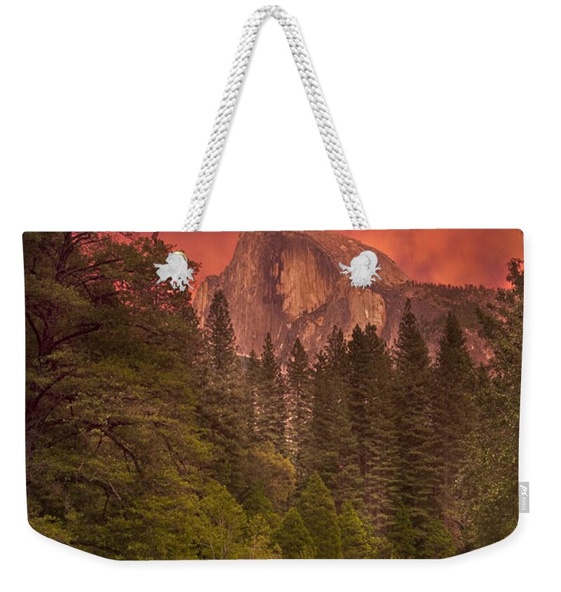 Half Dome; Sunset; Yosemite National Park; Mariposa County; California; River; Trees; Rock; Pine Trees; Clouds; Outdoor; Nature; Landscape; Scenic; Photography; Warm; Vertical; Summer; July; Evening; Red; Green; Long Exposure; Nikon Weekender Tote Bag featuring the photograph Strength and Romance by Greg Wyatt