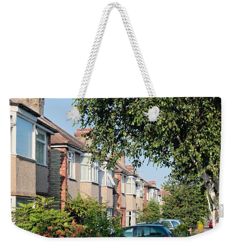 1930s Weekender Tote Bag featuring the photograph Suburban England by Tom Gowanlock