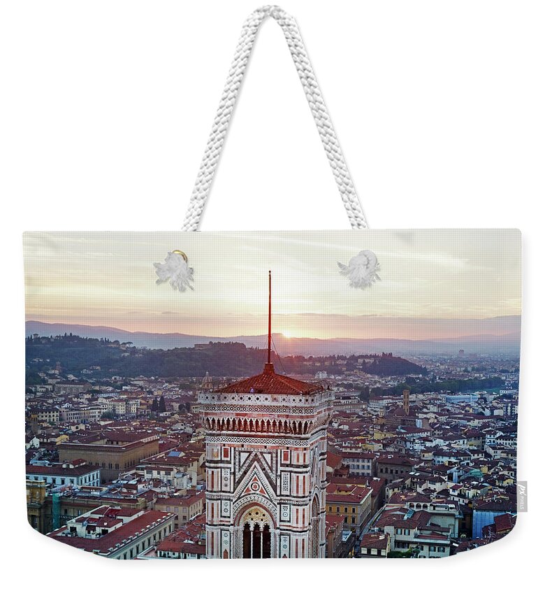 Gothic Style Weekender Tote Bag featuring the photograph Sun Setting Behind Giottos Bell Tower by Allan Baxter