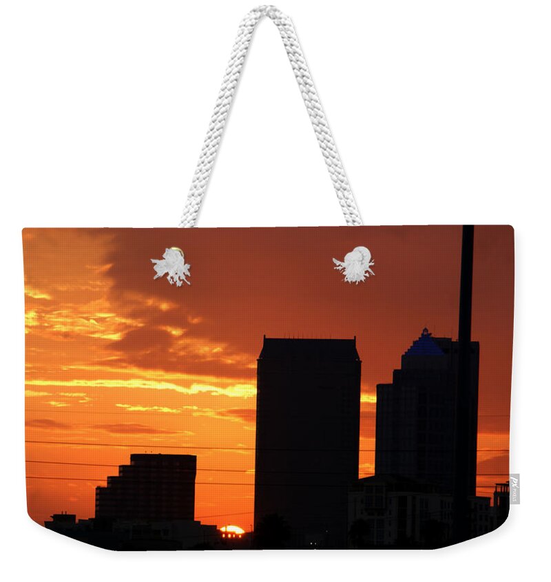 Buildings Weekender Tote Bag featuring the photograph Sun setting on Downtown Tampa by Chauncy Holmes