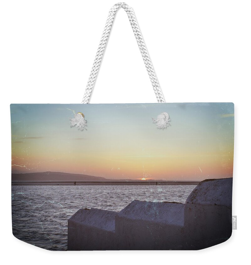 Water Weekender Tote Bag featuring the photograph Sun setting over Wales by Spikey Mouse Photography