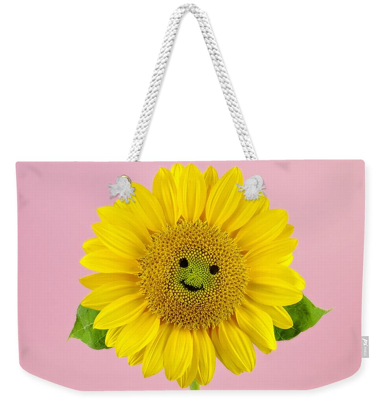 Yellow Weekender Tote Bag featuring the photograph Sunflower Smiley Face by Juj Winn