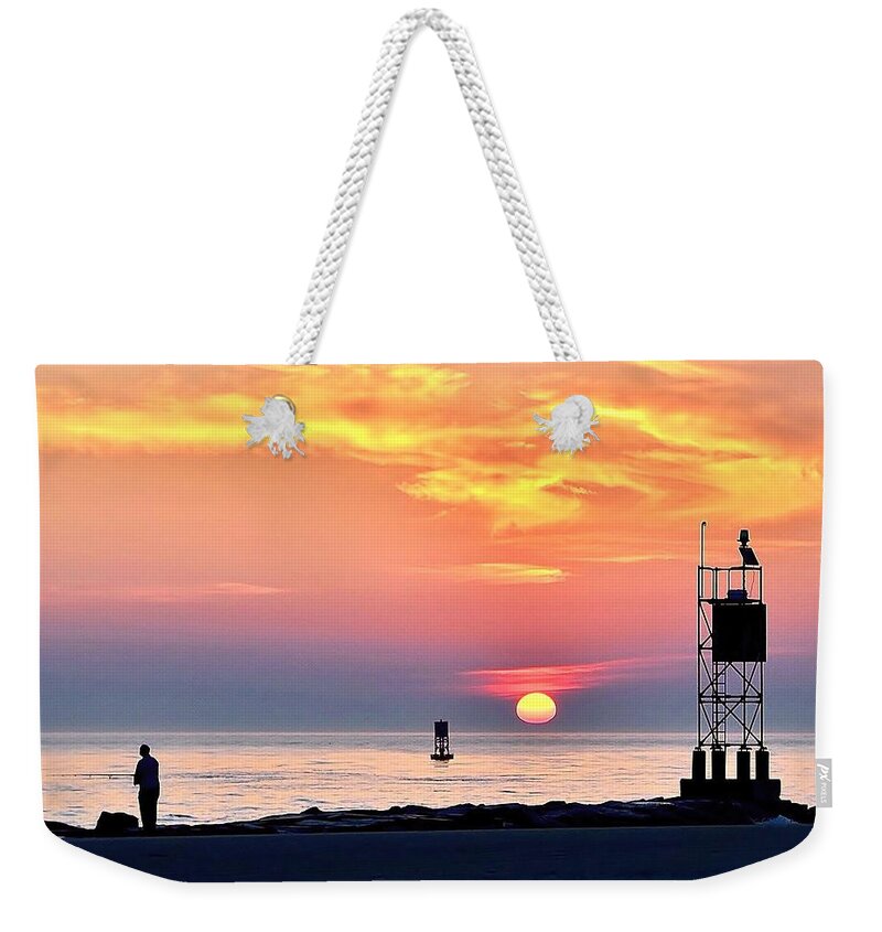 Sunrise Weekender Tote Bag featuring the photograph Sunrise at Indian River Inlet by Kim Bemis