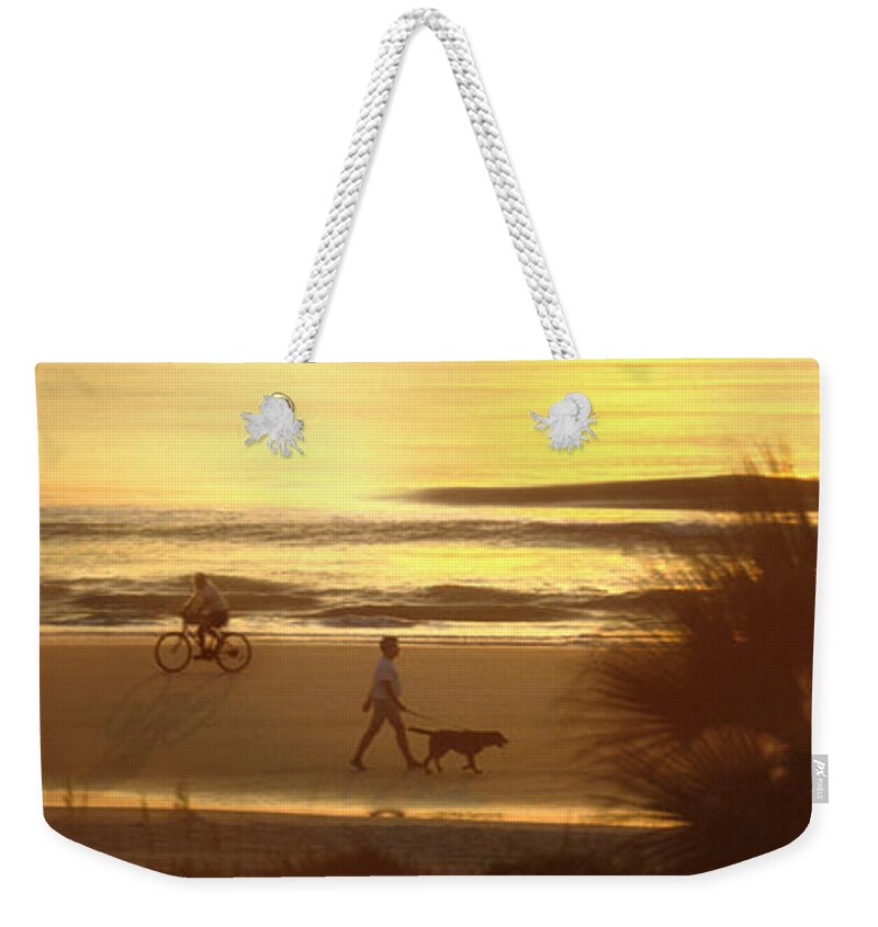 North Carolina Sunrise Weekender Tote Bag featuring the photograph Sunrise at Topsail Island Panoramic by Mike McGlothlen