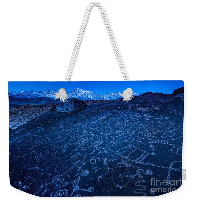 Petroglyph Weekender Tote Bag featuring the photograph Sunrise on Sky Rock Petroglyph and Sierra Nevada Mountains by Gary Whitton