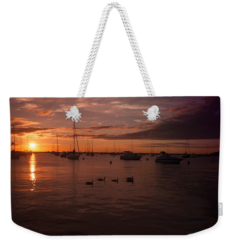 Sunrise Weekender Tote Bag featuring the photograph Sunrise over Lake Michigan by Miguel Winterpacht