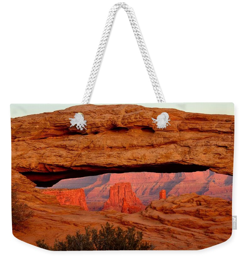 Mesa Weekender Tote Bag featuring the photograph Sunset at Mesa Arch by Tranquil Light Photography