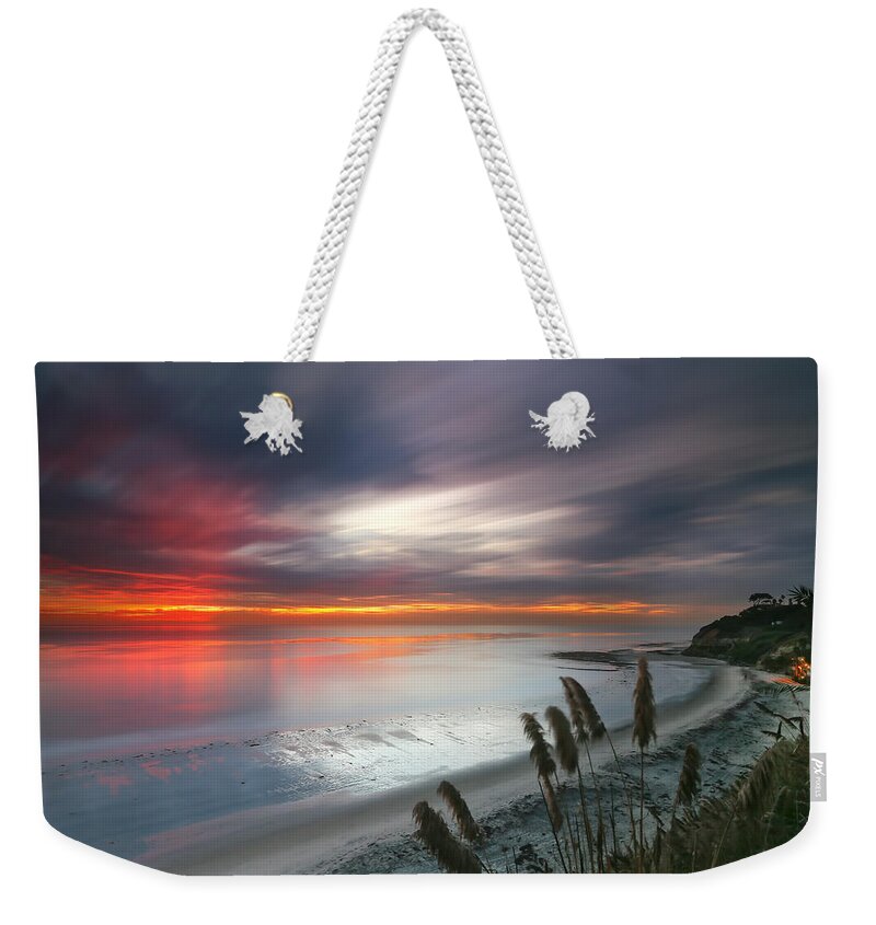Sunset Weekender Tote Bag featuring the photograph Sunset at Swamis Beach 4 by Larry Marshall