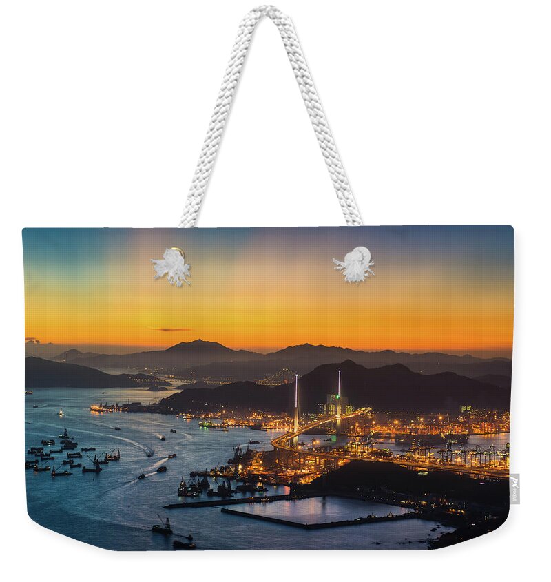 Orange Color Weekender Tote Bag featuring the photograph Sunset At The Stonecutters Bridge by Coolbiere Photograph