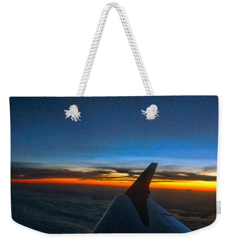 Sunset Weekender Tote Bag featuring the photograph Sunset at thirty thousand Feet by Ron Roberts