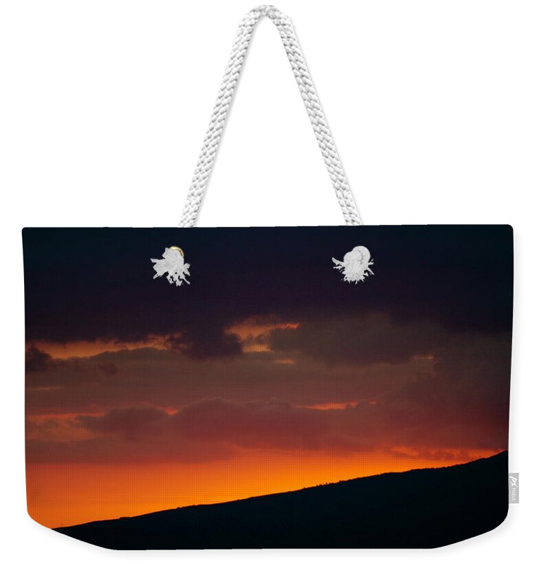 Sunset Weekender Tote Bag featuring the photograph Stunning sunsets beyond the Waianae mountain range by Lehua Pekelo-Stearns