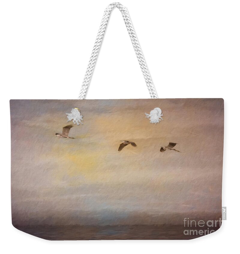 Great Blue Herons Weekender Tote Bag featuring the digital art Sunset Flight by Jayne Carney