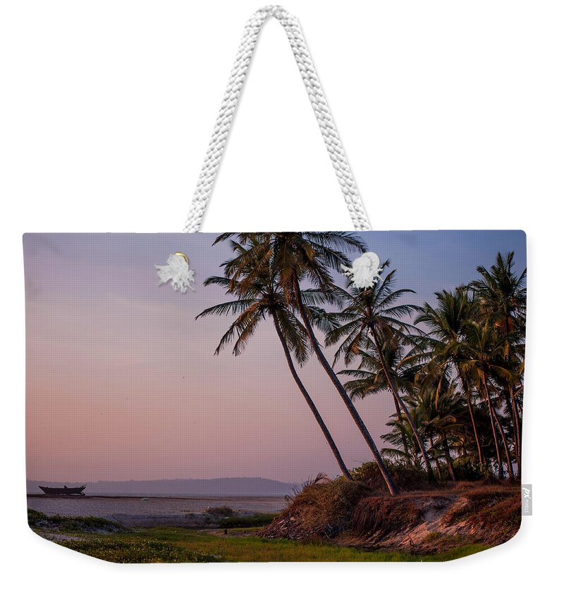Jenny Rainbow Fine Art Photography Weekender Tote Bag featuring the photograph Sunset over the Goan Beach. India by Jenny Rainbow