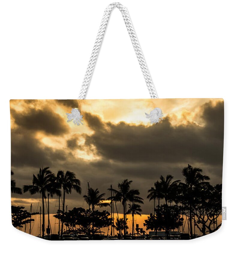 Hilton Weekender Tote Bag featuring the photograph Sunset over Waikiki by Angela DeFrias