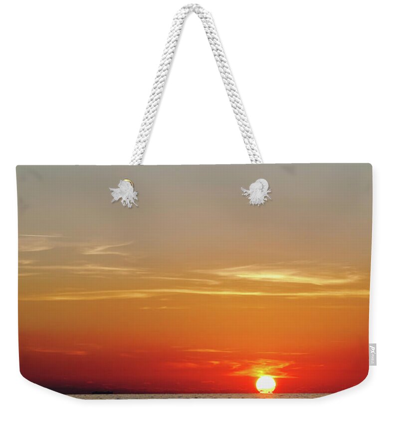 Scenics Weekender Tote Bag featuring the photograph Sunset Over Water by Dallas Stribley