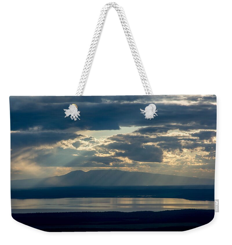 Mountain Weekender Tote Bag featuring the photograph Sunset Rays Over Mount Susitna by Andrew Matwijec