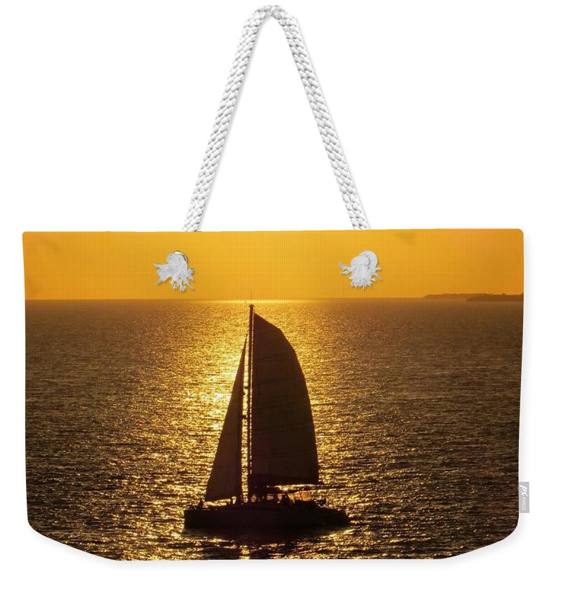 Key West Weekender Tote Bag featuring the photograph Sunset Sail by Jennifer Wheatley Wolf
