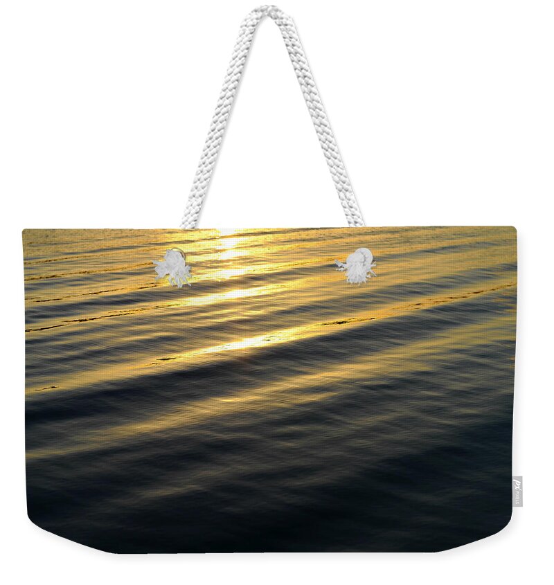 Water Weekender Tote Bag featuring the photograph Sunset Waves by Laura Fasulo