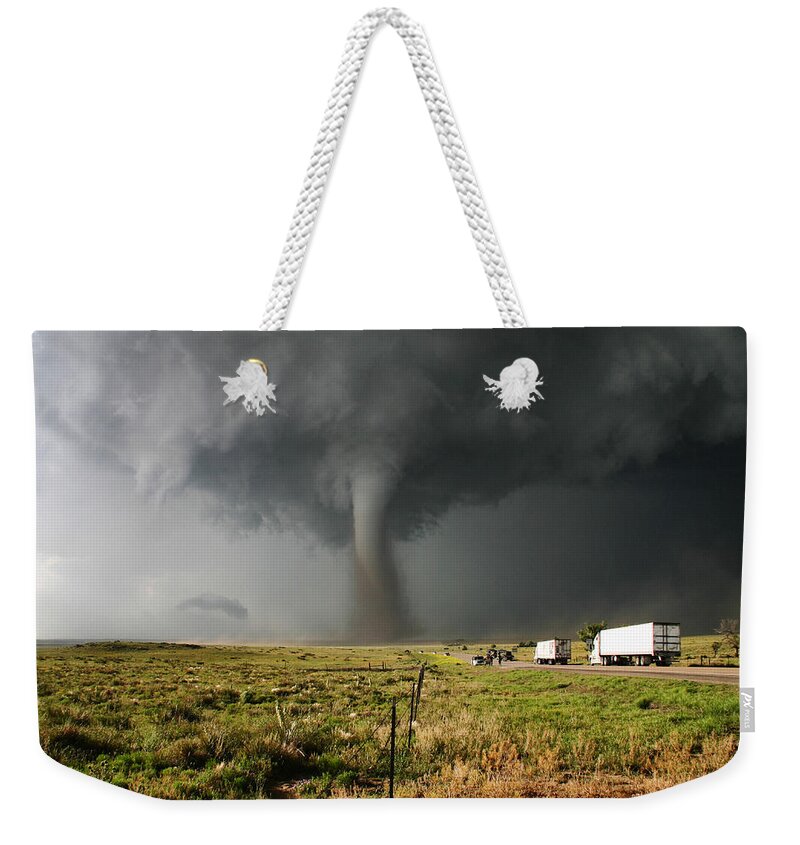 Atmosphere Weekender Tote Bag featuring the photograph Supercell And Trucks by Jason Persoff Stormdoctor